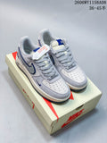 Pair of pale gray and off-white Nike Air Force 1 '07 low-top sneakers with blue accents, displayed on a shoe box