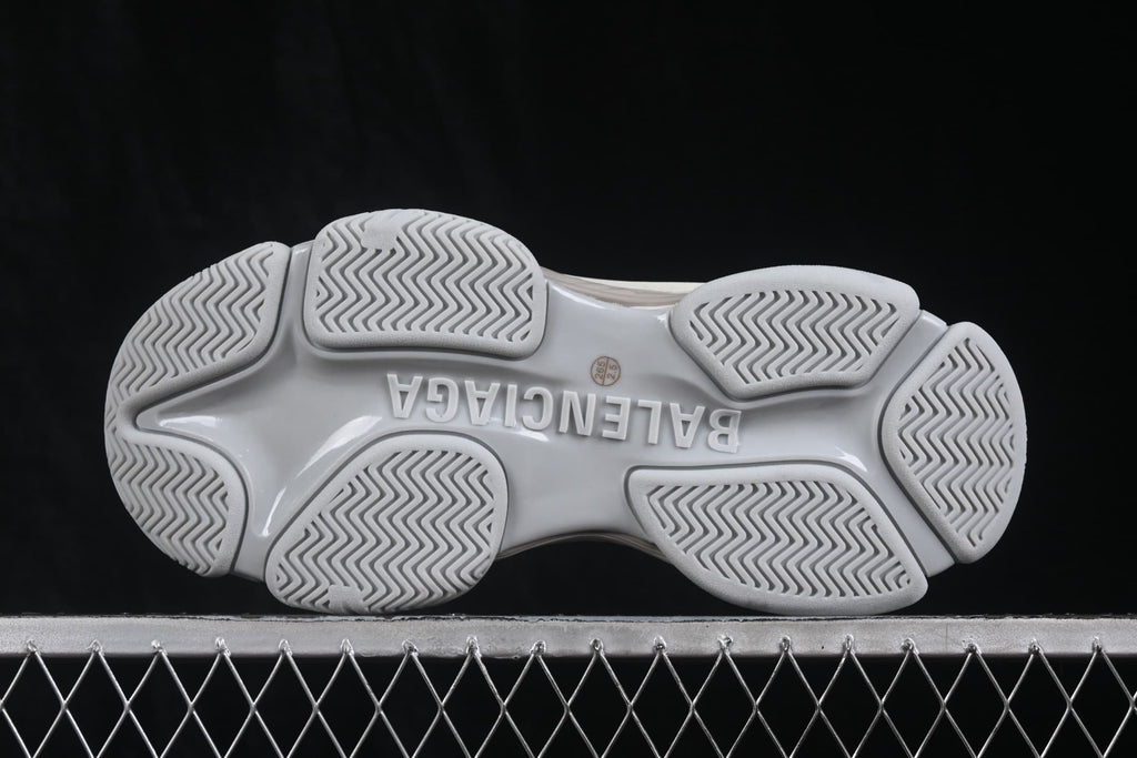 Underside of the sneaker showing the Balenciaga outsole branding and patterned tread sections.