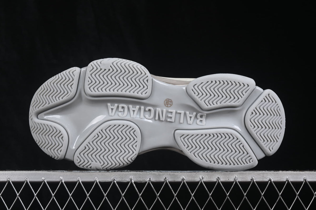 Underside of the sneaker showing the Balenciaga outsole branding and patterned tread sections.