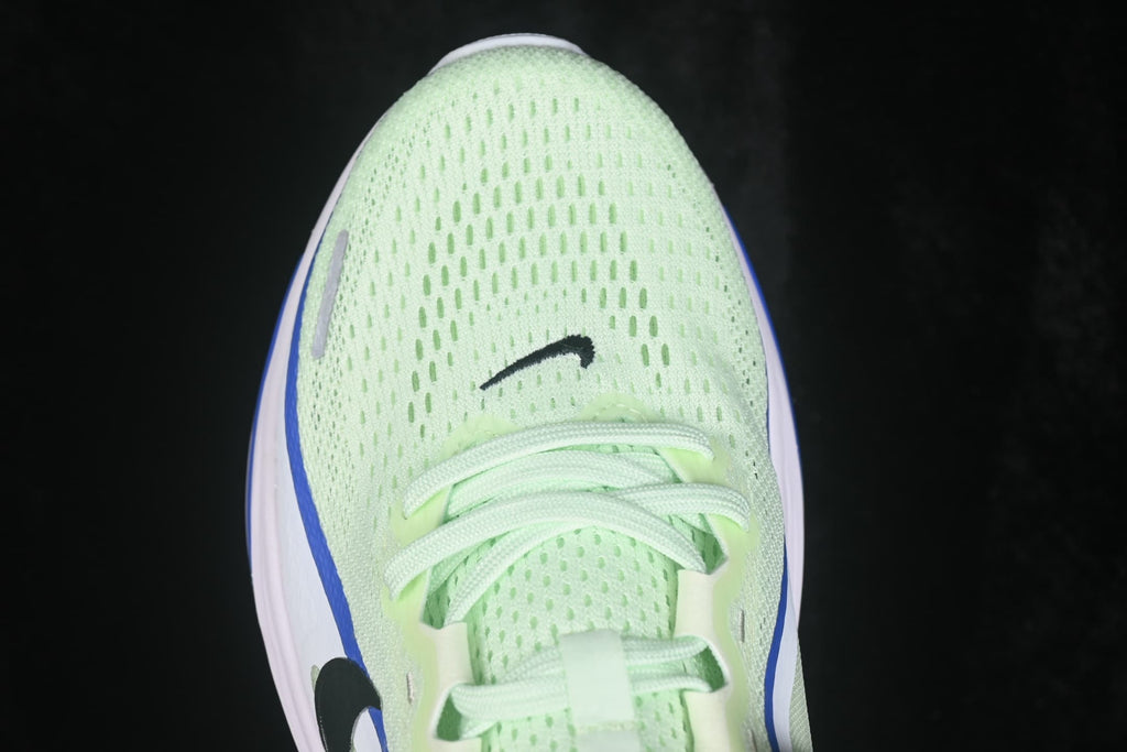 Close-up of the perforated toe box, laces and black Swoosh detail.