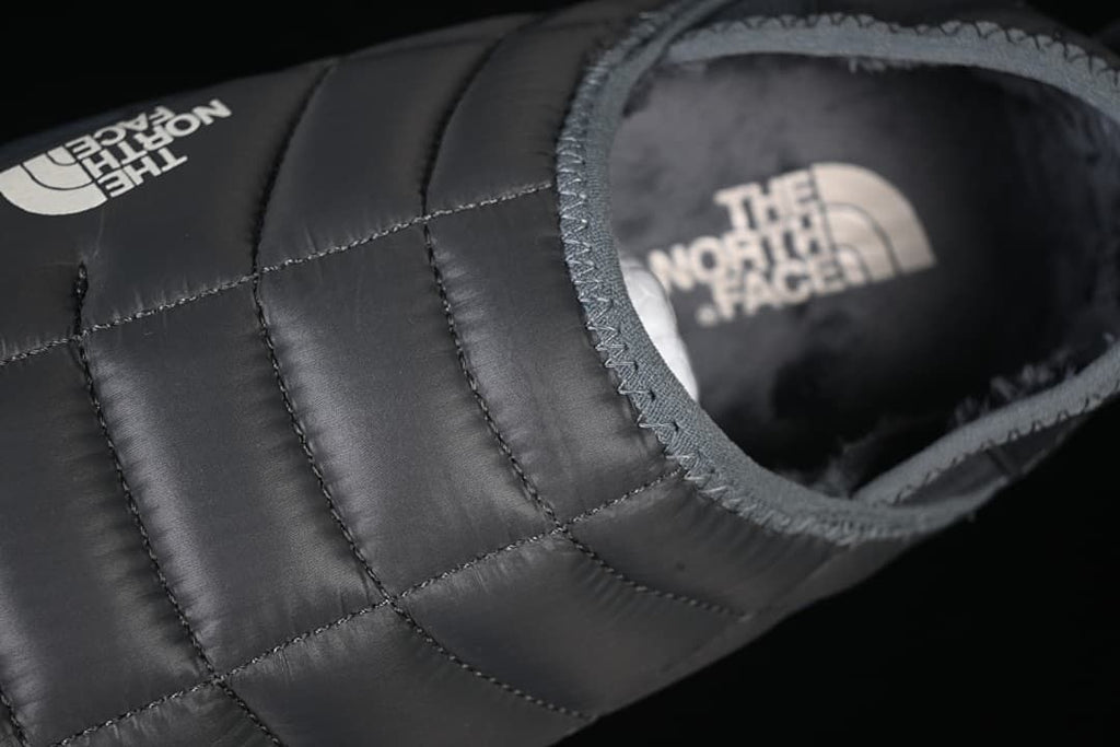 Close-up view of the mule opening and padded quilted upper