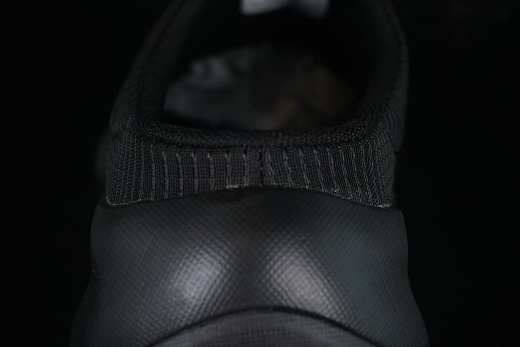 Close-up of the padded heel opening and textured heel panel