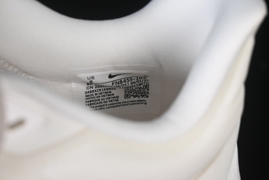 Close-up of the interior shoe label showing style code FN8455-105.