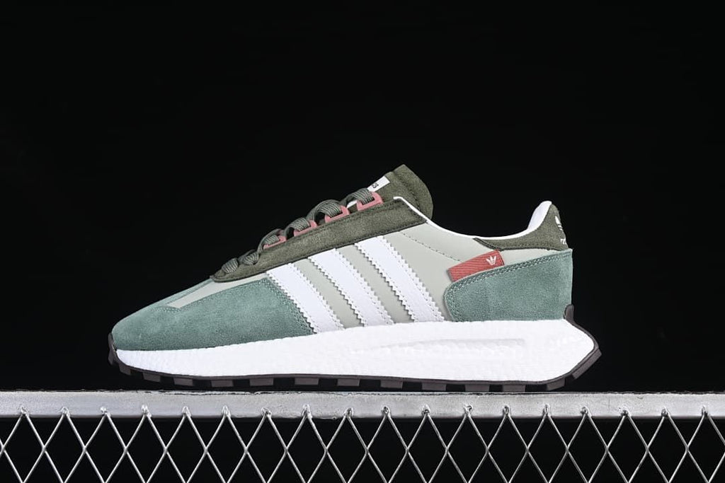 Side profile of one adidas Retropy E5 sneaker in green, gray, and white