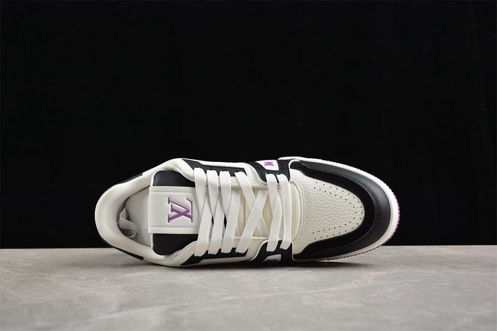 Top view of the sneaker showing the laces, tongue, and perforated toe panel