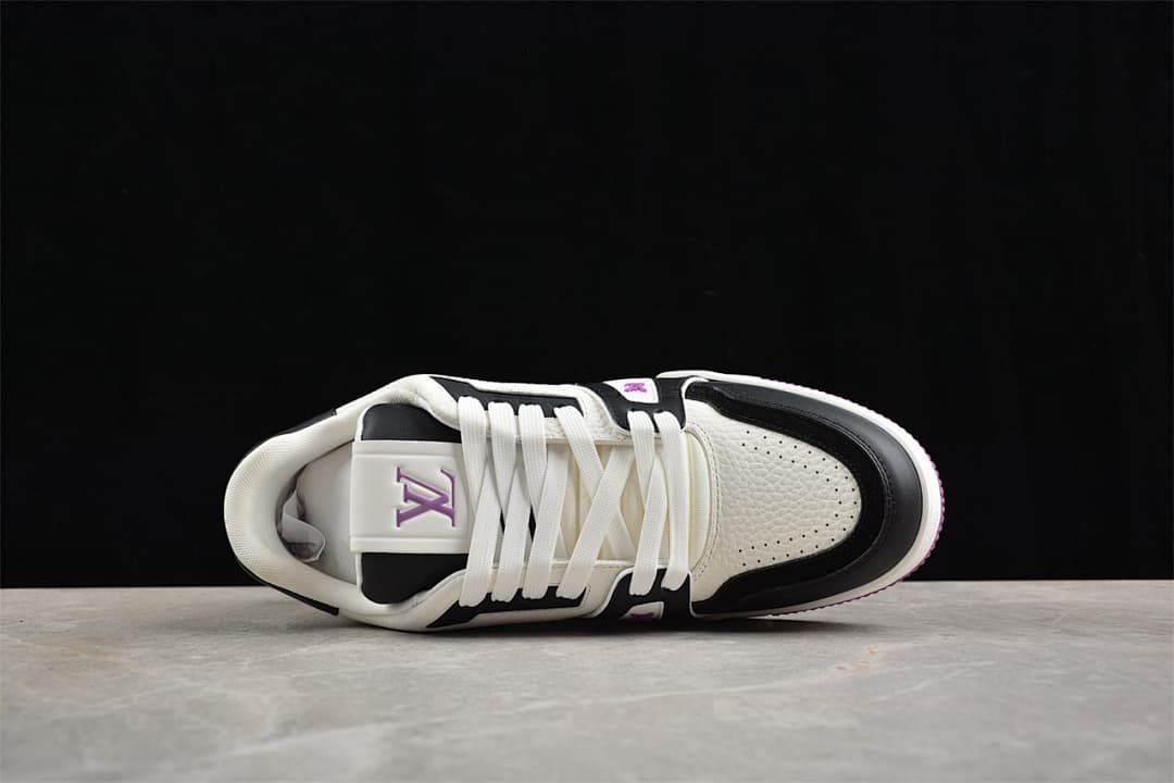 Top view of the sneaker showing the laces, tongue, and perforated toe panel