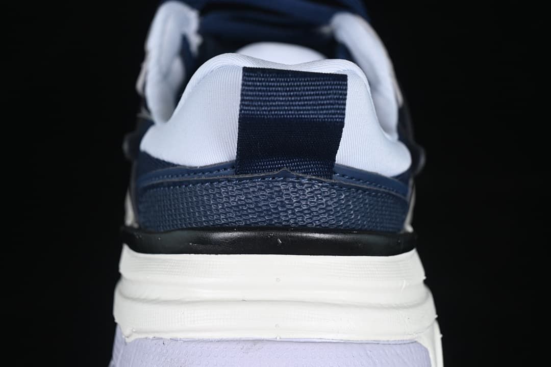 Rear view showing the heel pull tab and layered sole