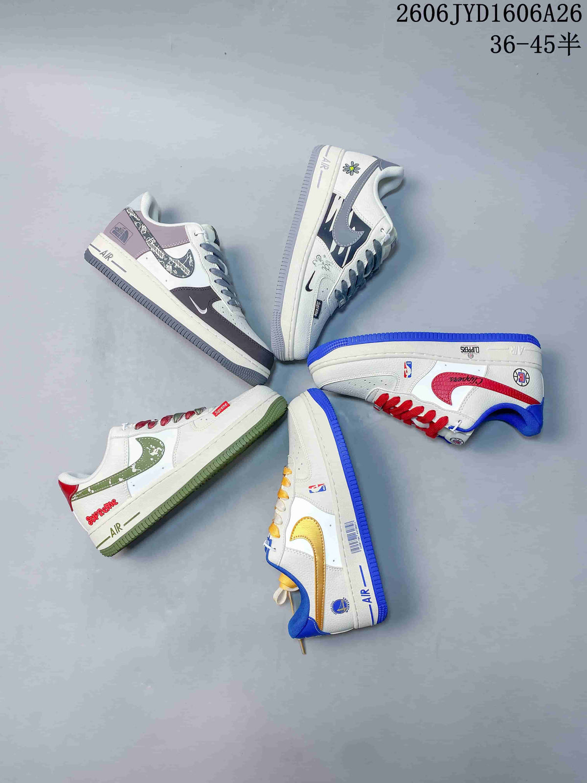 Group of low-top sneakers showing several graphic and color variations