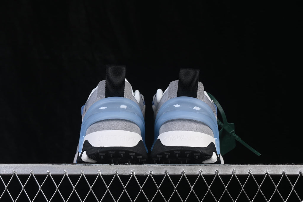 Rear view showing the blue heel detail and black pull tabs