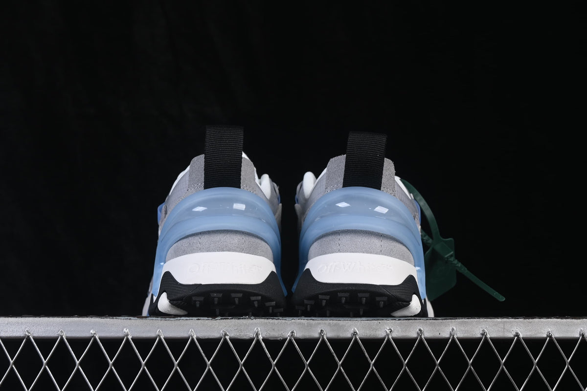 Rear view showing the blue heel detail and black pull tabs