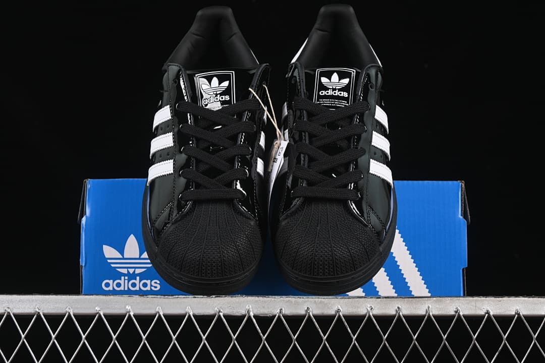 Front view of the pair showing the shell toes, laces and white stripes