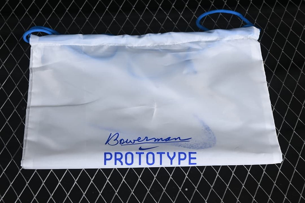 White drawstring shoe bag marked Bowerman and Prototype