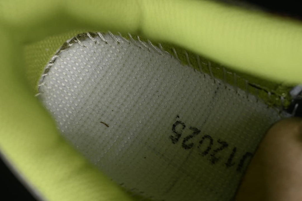 Close-up inside the shoe showing a printed size marking.