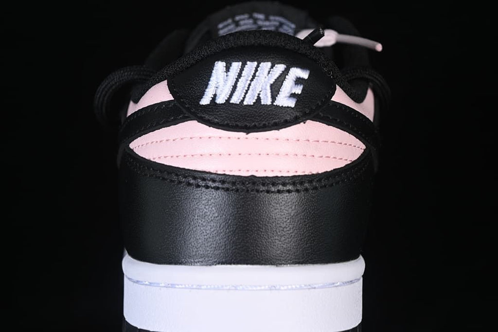 Rear view showing the black and pale pink heel panels