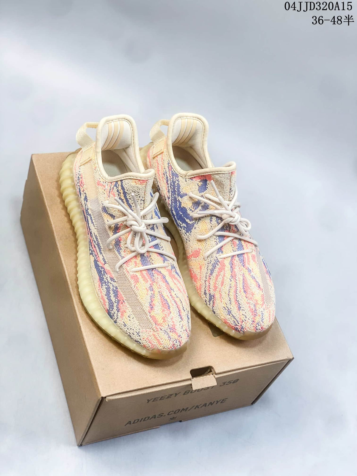 Pair of multicolor Adidas Yeezy Boost 350 V2 sneakers on a shoebox; image overlay shows sizes 36–48.5 and style code 04JJD320A15.
