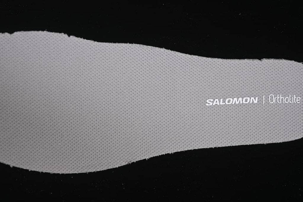 Close-up of the insole marked Salomon and Ortholite.