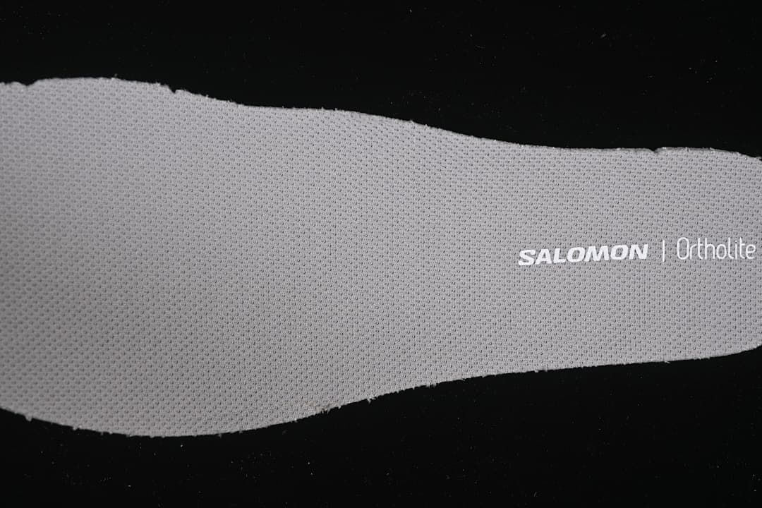 Close-up of the insole marked Salomon and Ortholite.