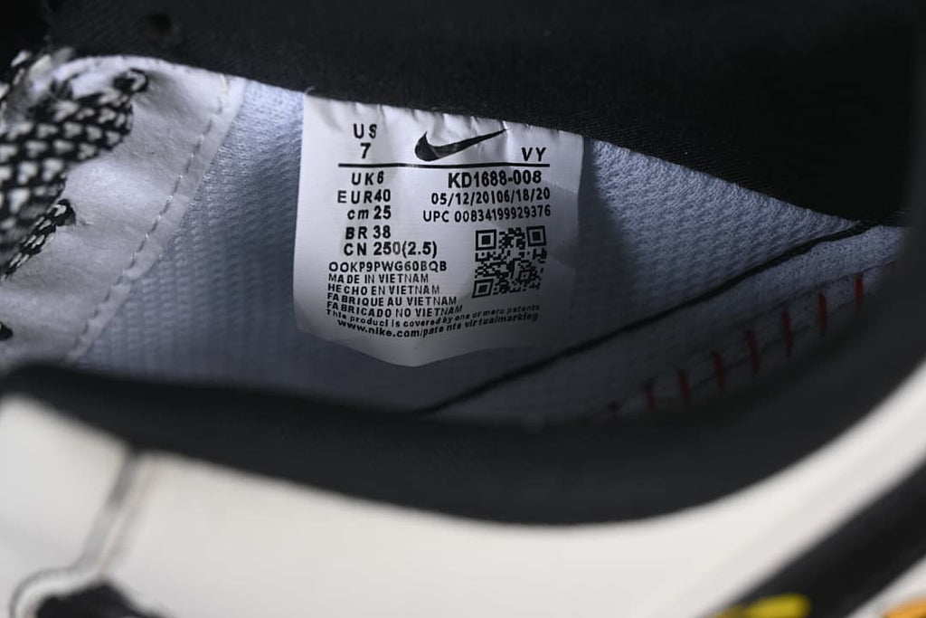 Interior shoe label showing EU 40, UK 6, US 7, and style code KD1688-008