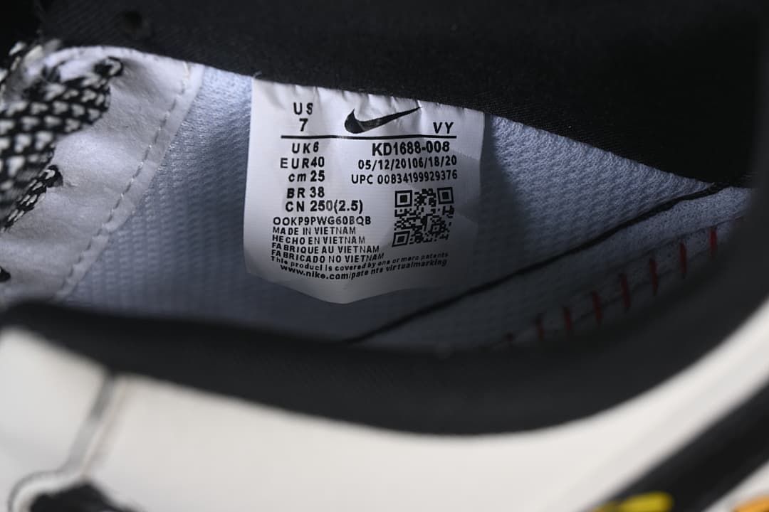 Interior shoe label showing EU 40, UK 6, US 7, and style code KD1688-008