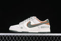 Side view of an off-white Nike SB Dunk Low with brown and dark green accents