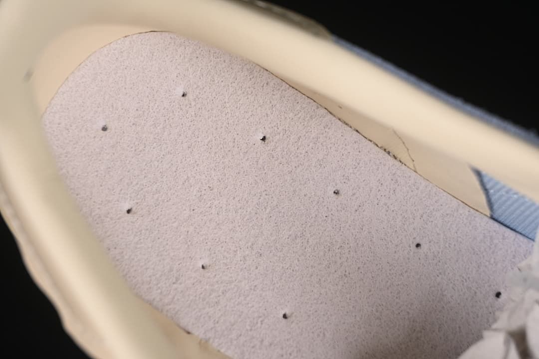 Close-up inside the sneaker showing the lining and footbed