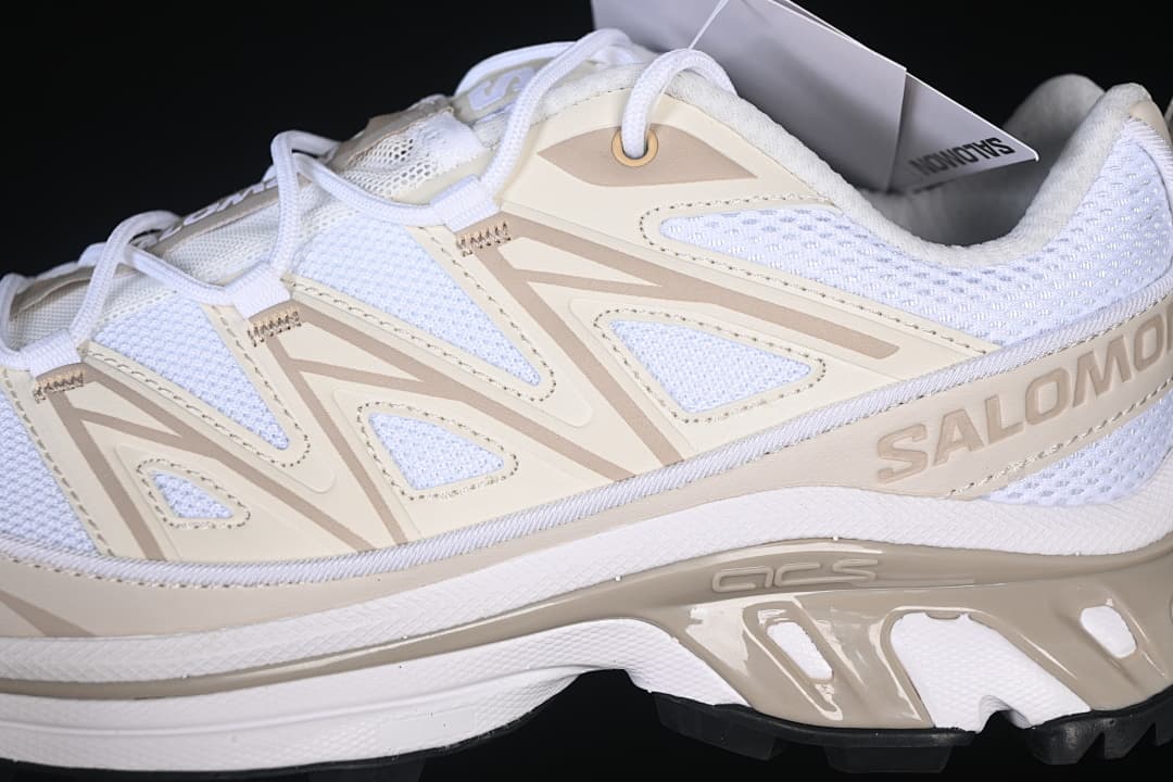 Close-up of the Salomon side branding and geometric overlays.