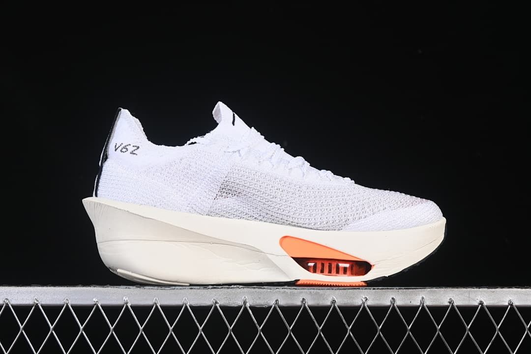 Side view of the white sneaker without the prominent side Swoosh visible