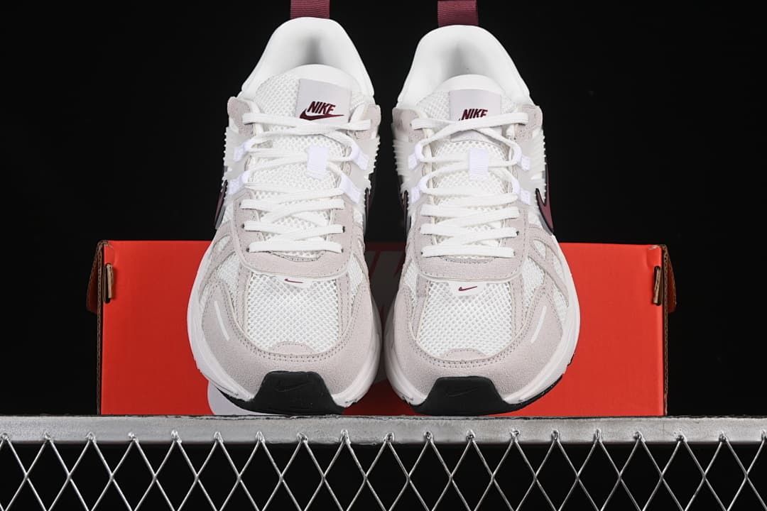Front view of the pair showing the mesh toe panels and laces