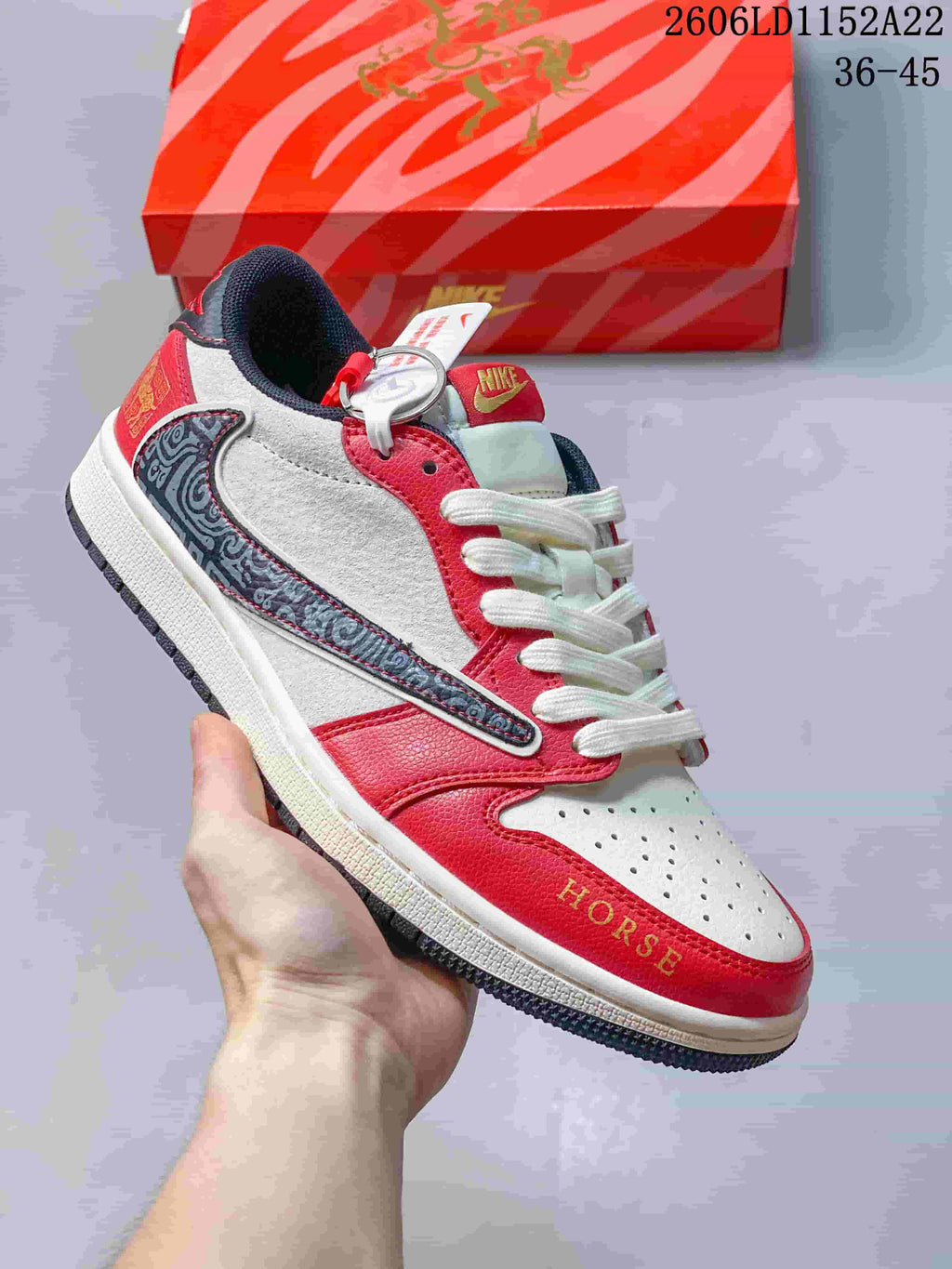 Low-top sneaker with white, red, and dark patterned panels and white laces; size range 36–45 is printed in the image.