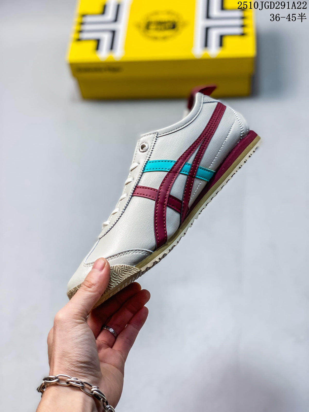 Side profile of an off-white Onitsuka Tiger sneaker with burgundy and turquoise stripes and a gum-colored outsole.