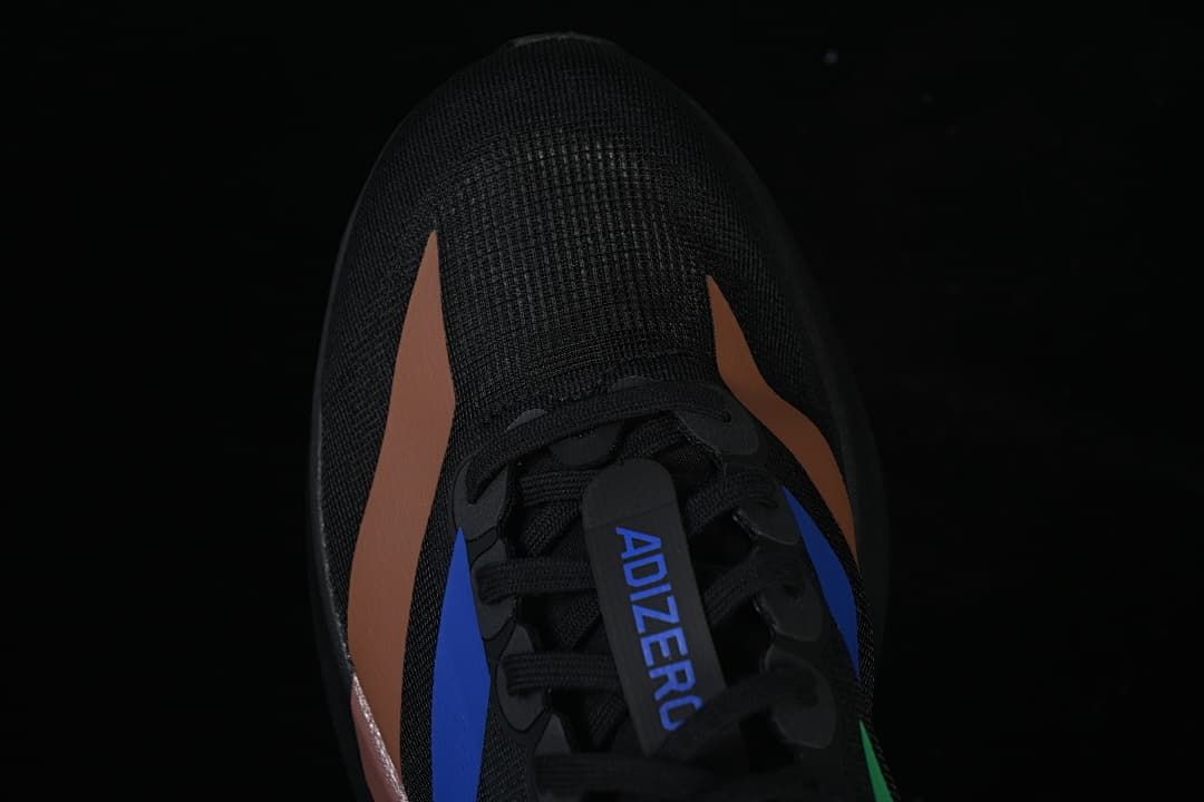 Top view of the black mesh-like toe and multicolor side accents.