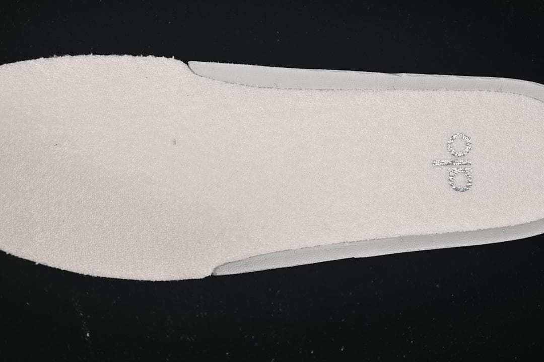 Close-up of the insole with Alo branding