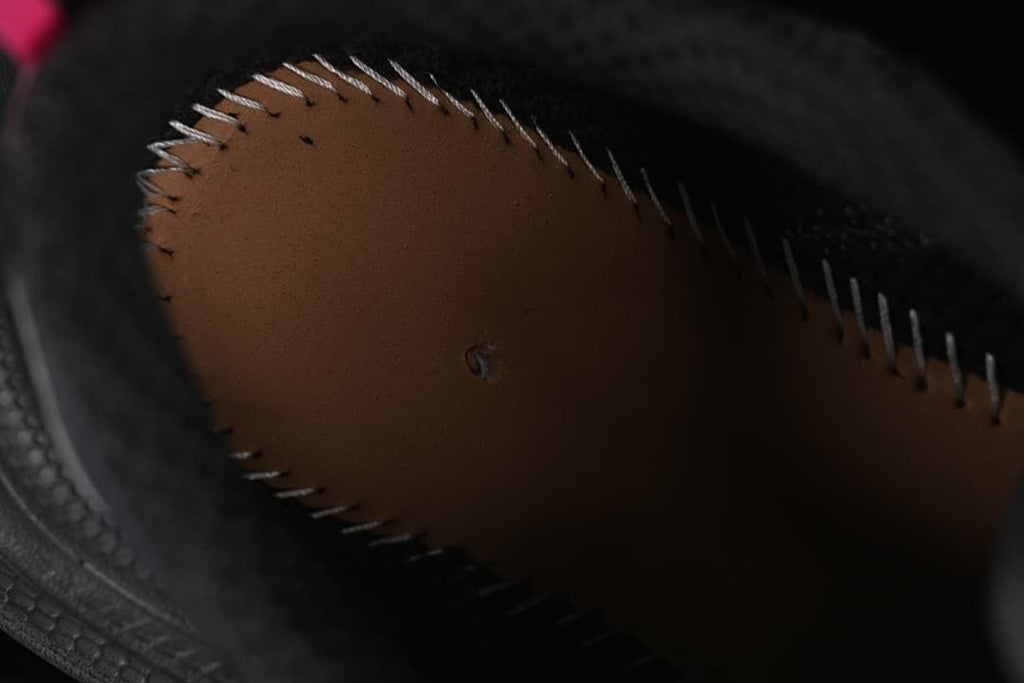Close-up inside the sneaker showing a stitched interior panel.