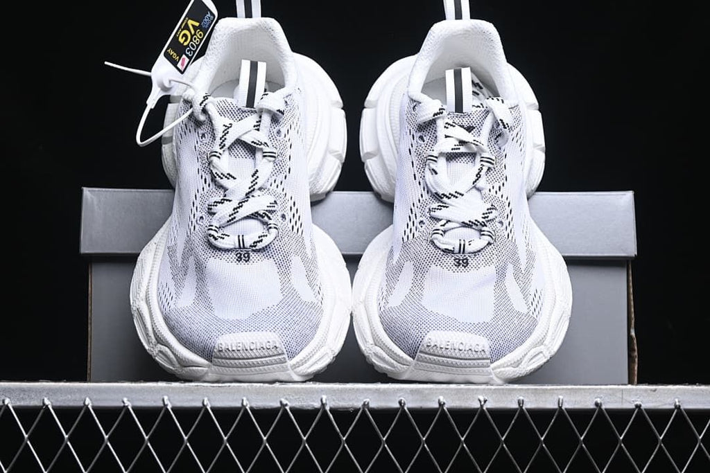 Front view of the pair showing lace-up uppers and toe details.