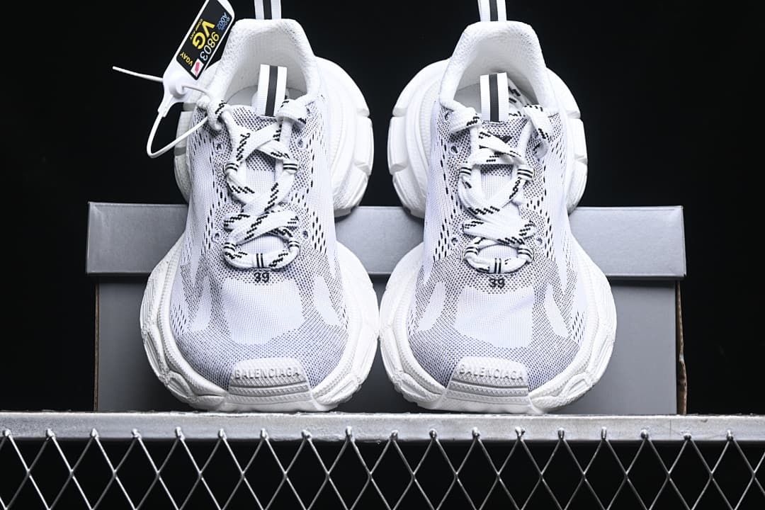 Front view of the pair showing lace-up uppers and toe details.