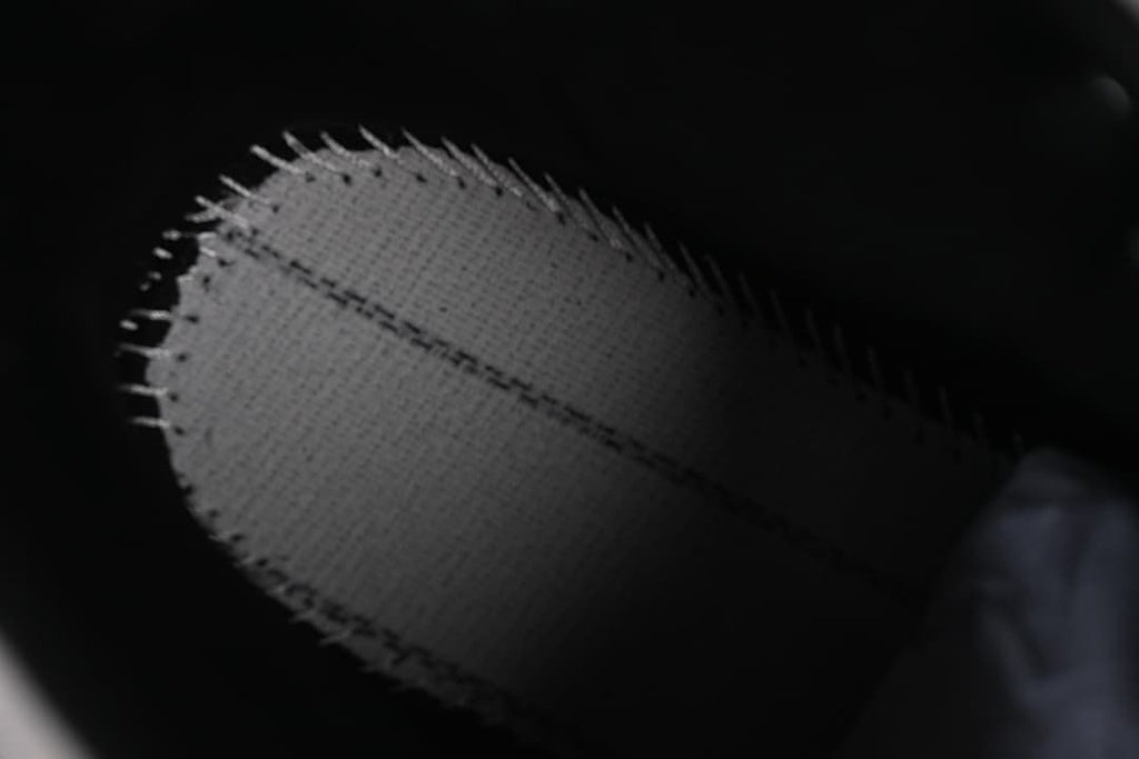 Close-up of stitching on the boot upper