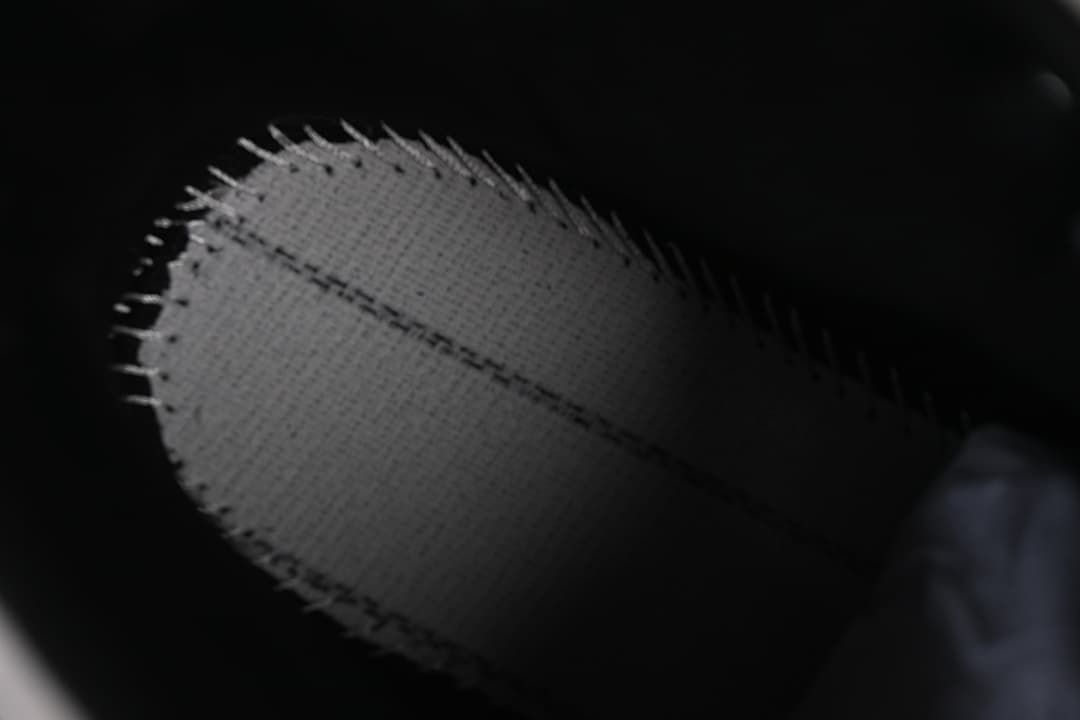 Close-up of stitching on the boot upper