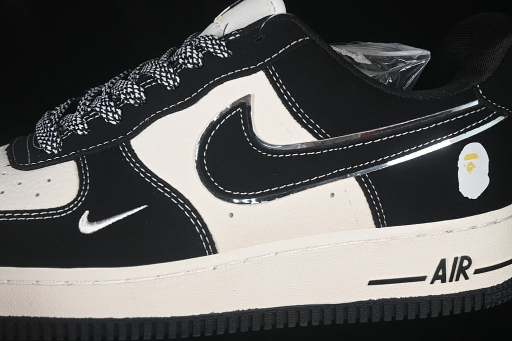 Close-up of the side panel, Swoosh, patterned laces, and heel graphic.