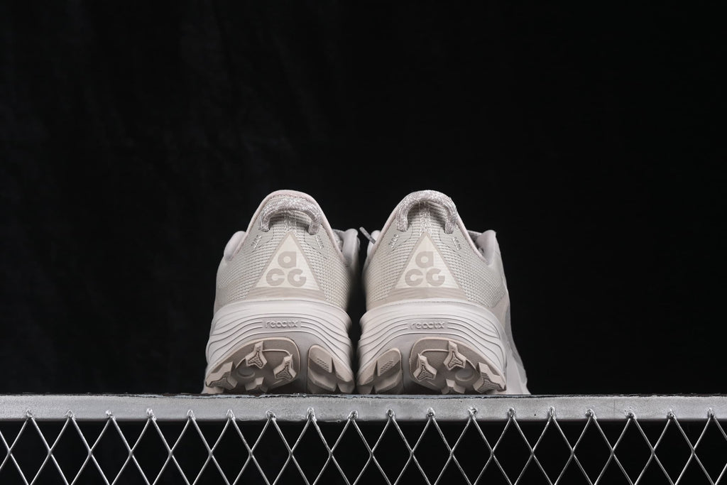 Rear view showing the ACG heel logos and layered outsole construction.