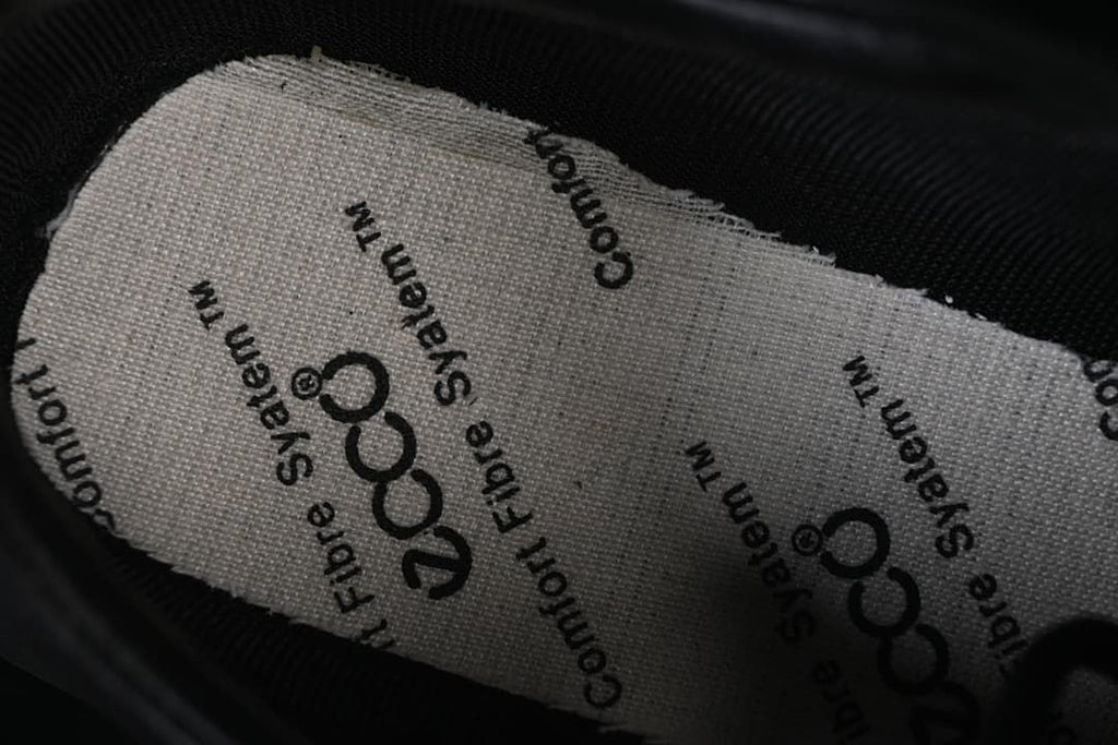 Close-up of the shoe tongue lining and printed text