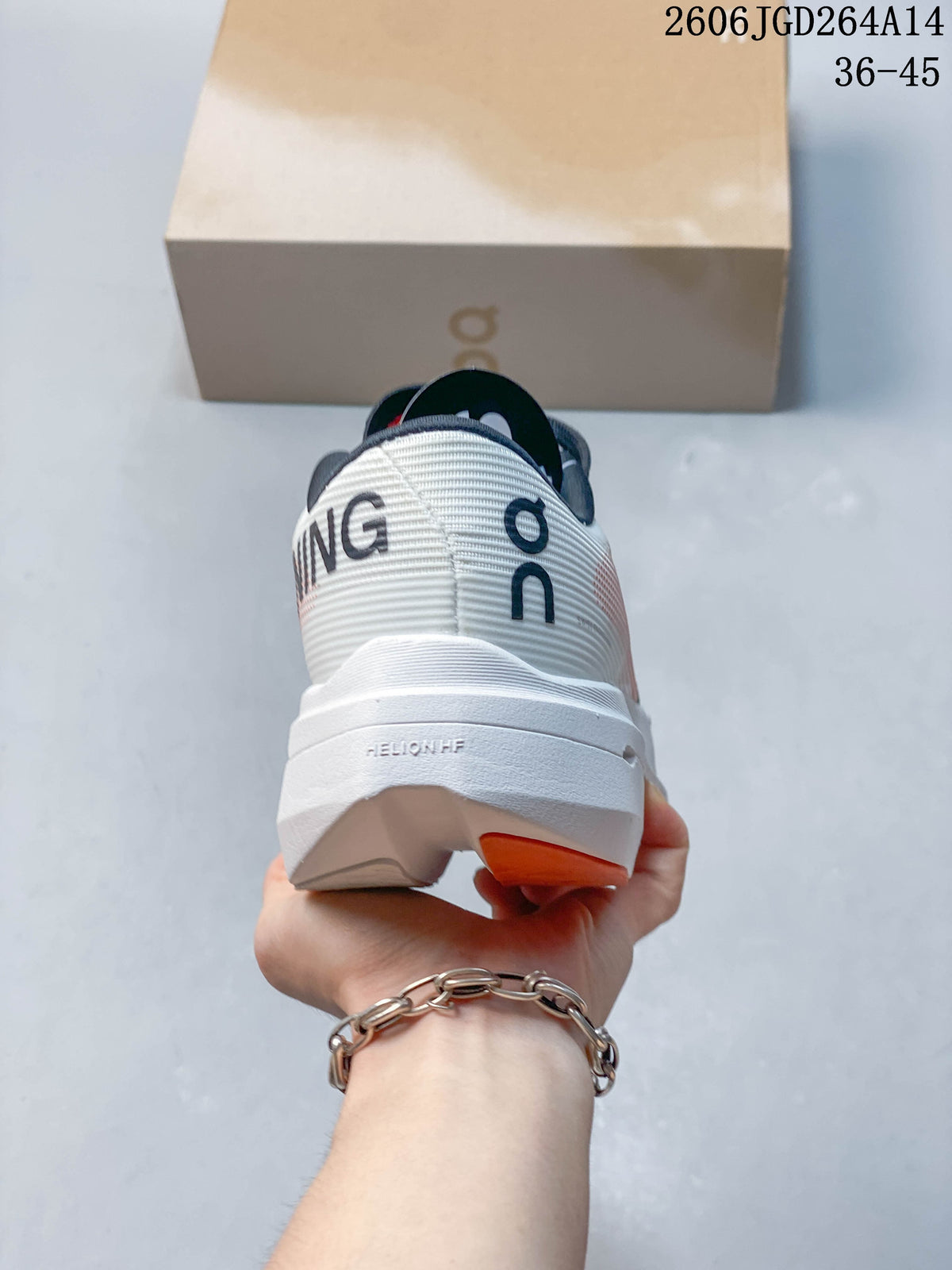 Rear view of an On Cloudboom Volt shoe showing its white heel and sculpted sole