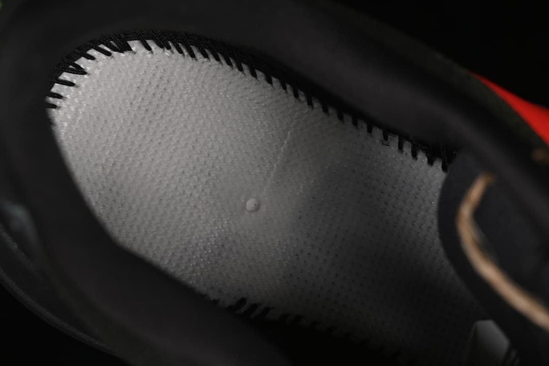 Close-up of the textured interior lining and stitching