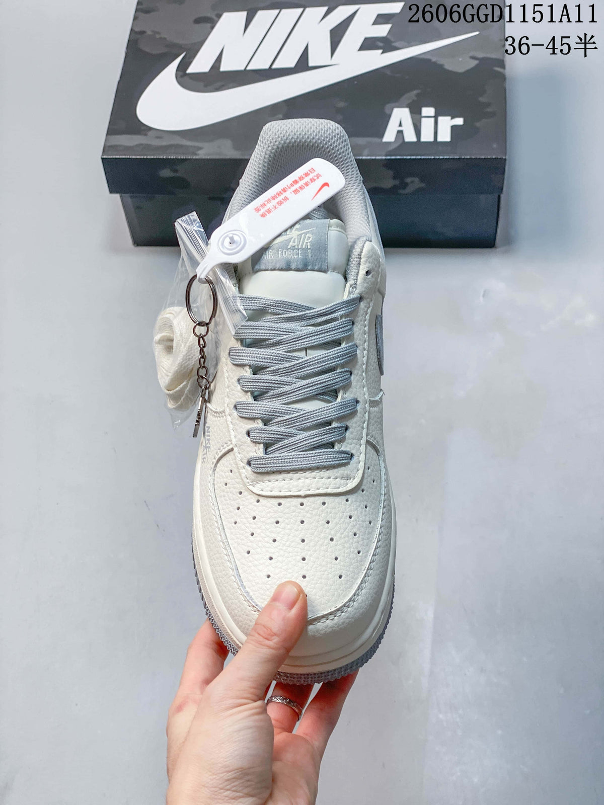Front view showing perforated toe, gray laces, and tongue detail