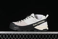 Side view of a Salomon X-ALP MM6 trail sneaker in vanilla, black, and almond milk