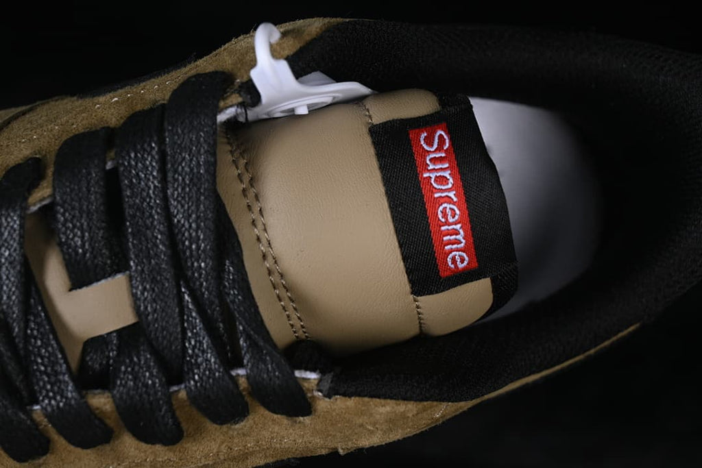 Close-up of the tongue label and black laces
