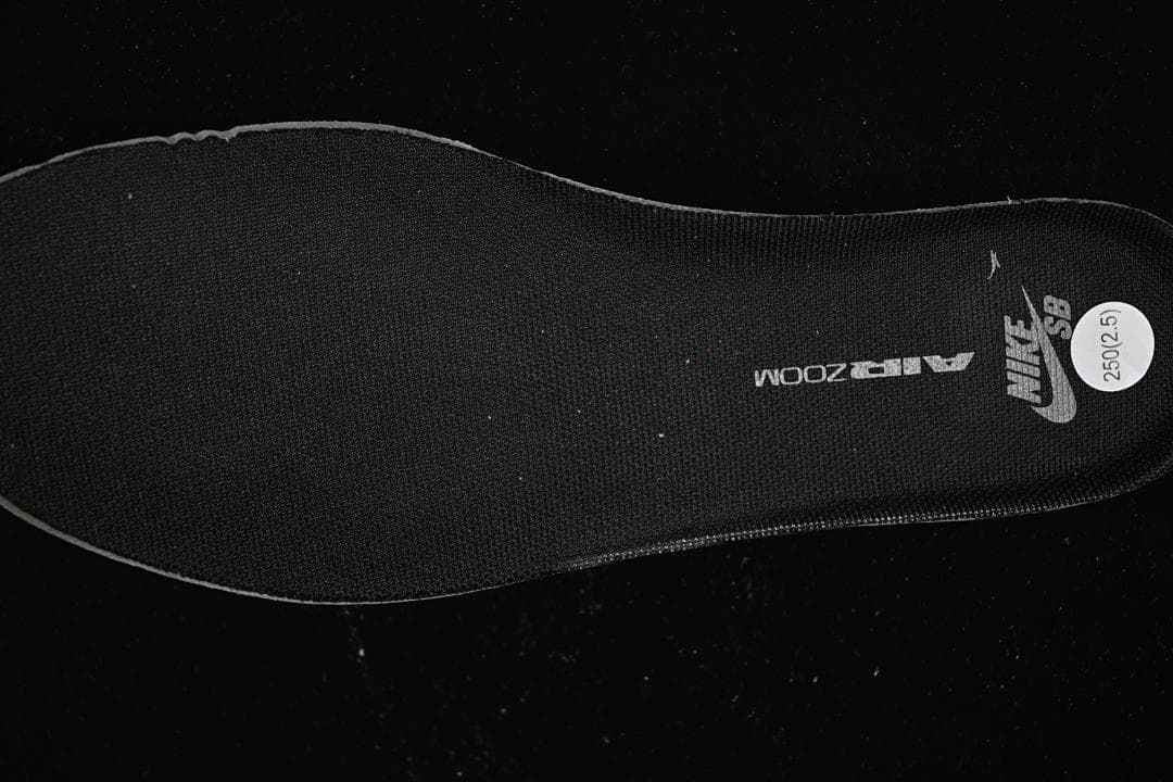 Black insole with Nike SB branding and a visible 25.0/2.5 marking