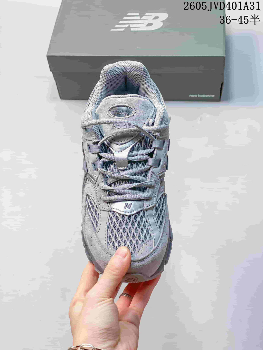 Top view showing the lace-up front, mesh panels, and 1954 tongue detail.