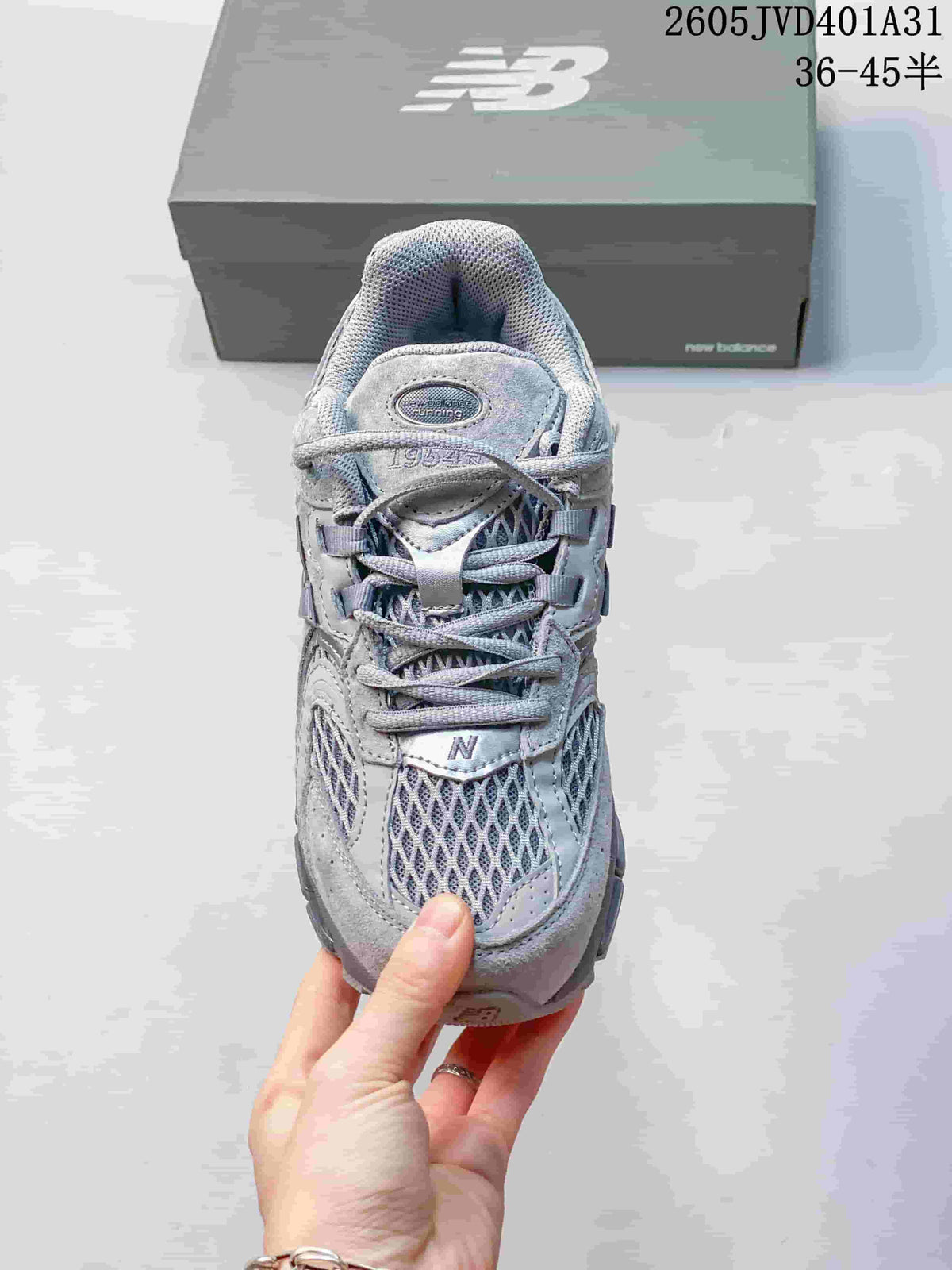 Top view showing the lace-up front, mesh panels, and 1954 tongue detail.