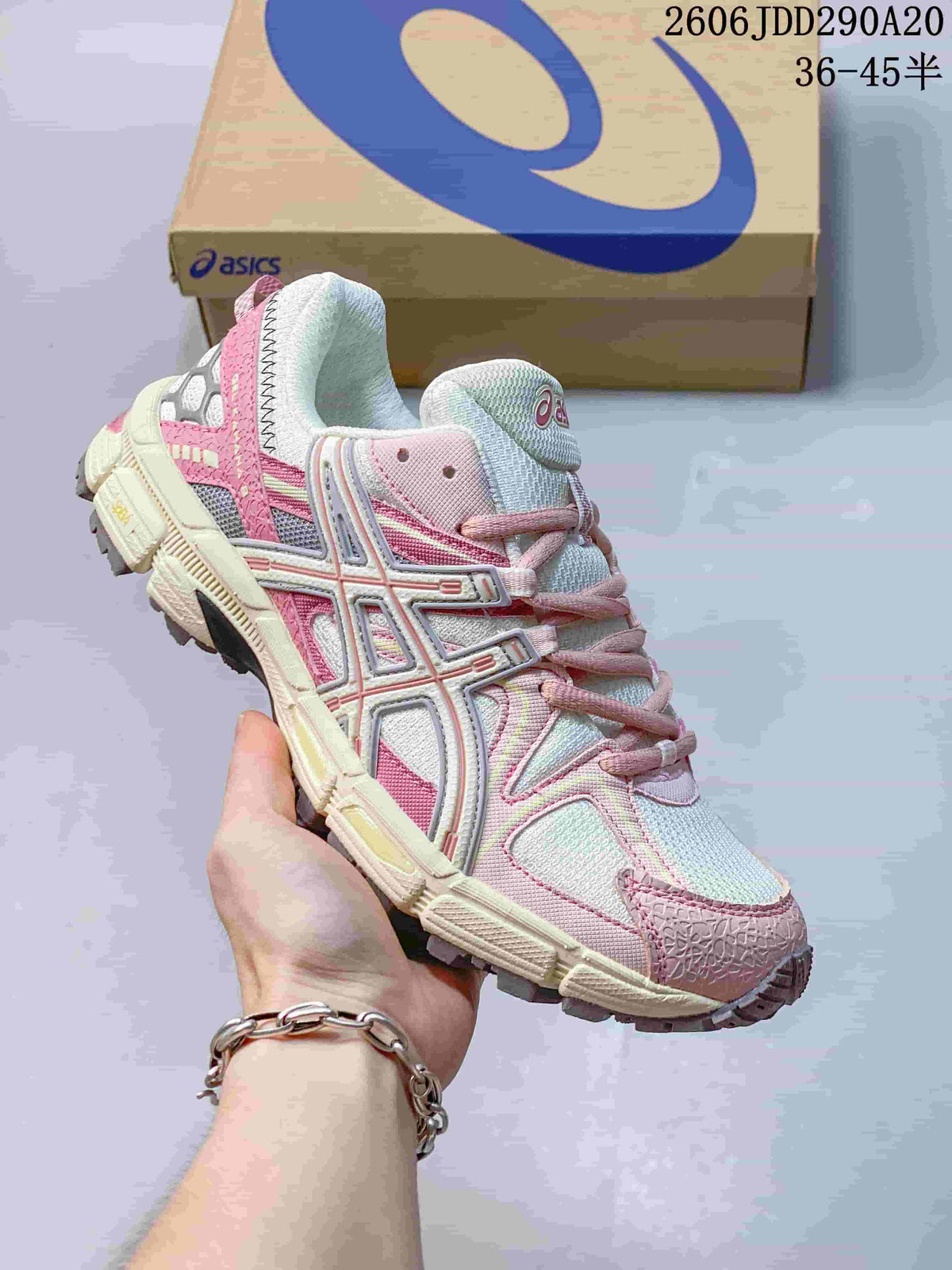 ASICS Gel-Kahana 8 sneaker in pale blue, white and pink.