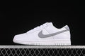Side profile of a white and grey Nike SB Dunk Low sneaker